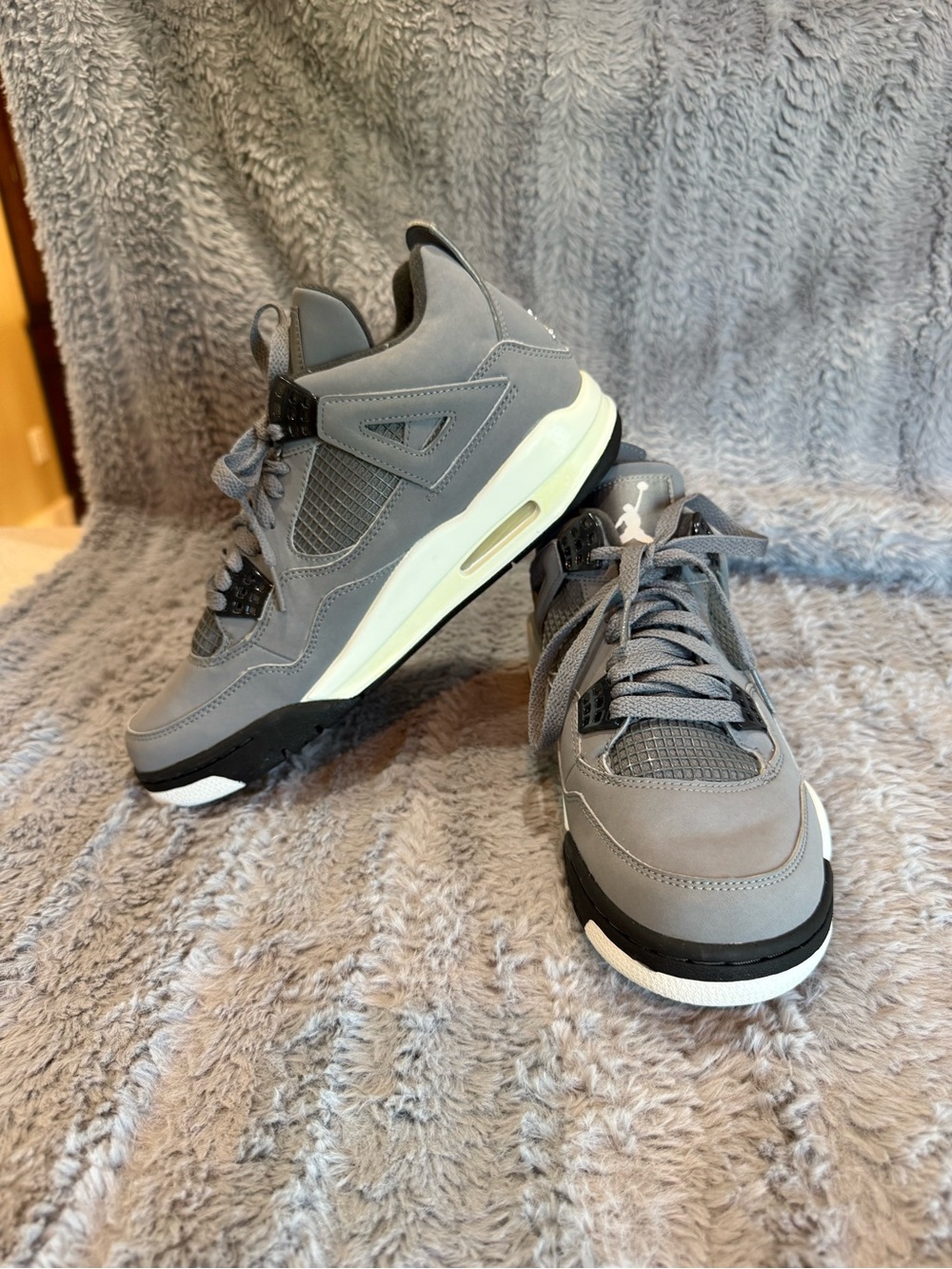 Air Jordan 4 Retro Men’s Sneakers in Grey with Black Accents